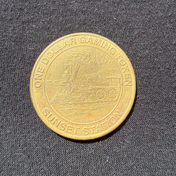 Sunset Station One Dollar Gaming Token - 1997 - Picture 2 of 2